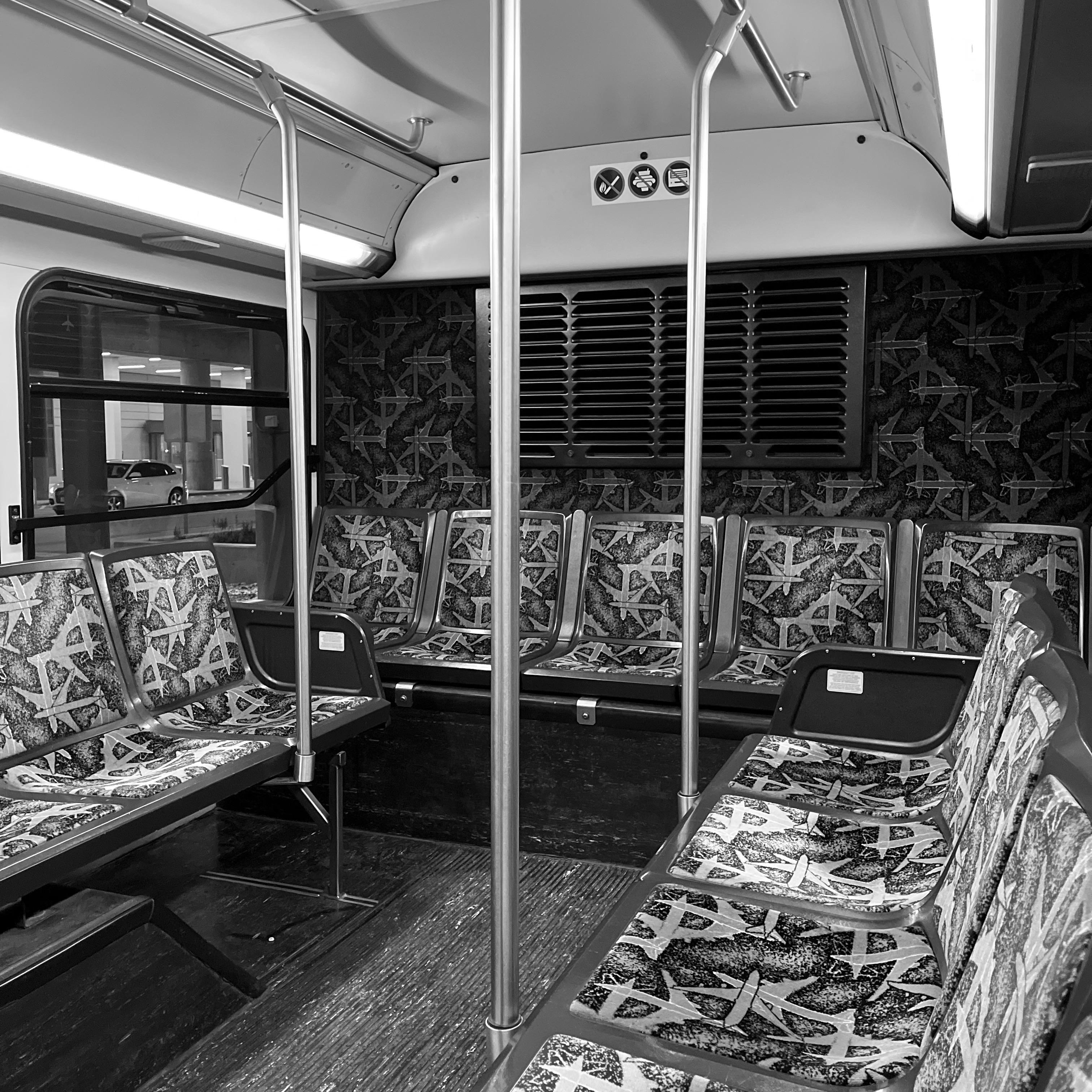 Empty seats in the back of a shuttle to the rental car facility at Kansas City International Airport